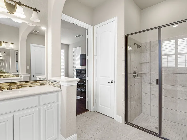Dual cabinet storage + a linen closet in the primary bath too.