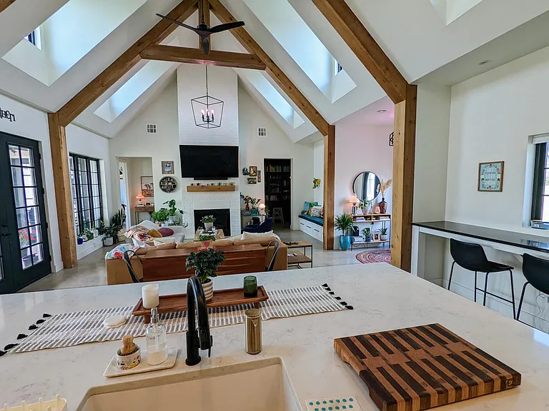 Shared living space, open floor plan kitchen and living room.