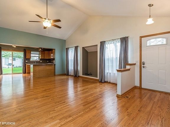 Vaulted ceilings, Hardwood Flooring and lots of room in this Living Space!