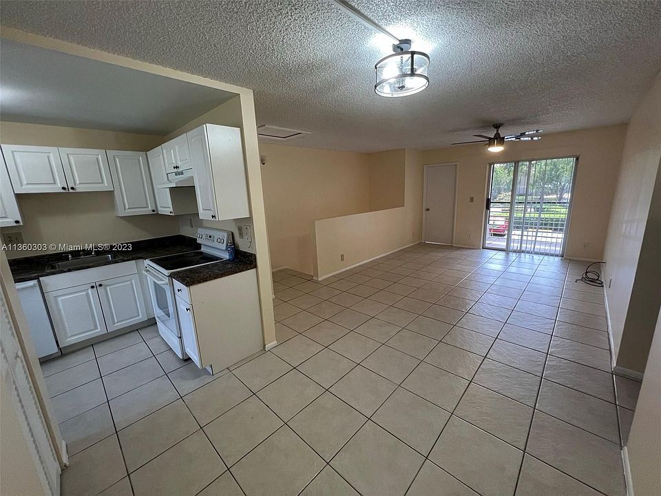 1st image of 701 Gardens Dr APT 203