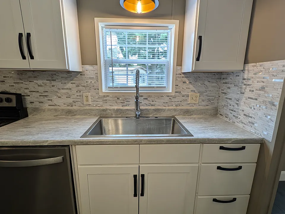 Deep sink with window above
