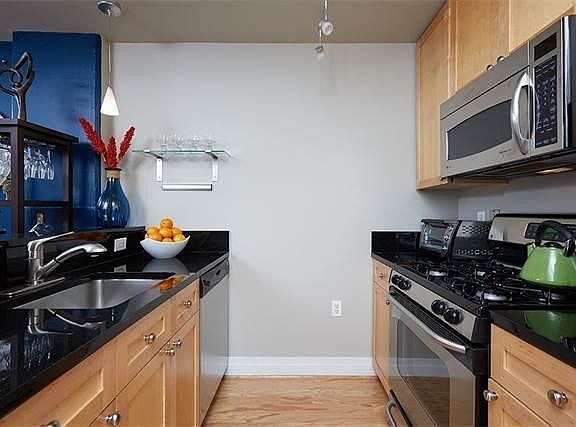 *Kitchen renovation: cabinets refinished with stone grey paint*