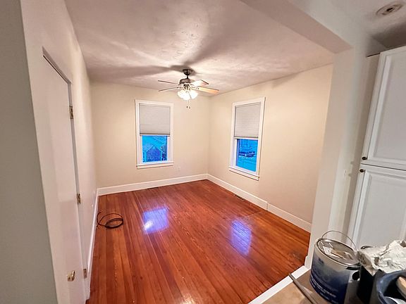 Living Room with ocean view. Cellular black out shades help conserve heat