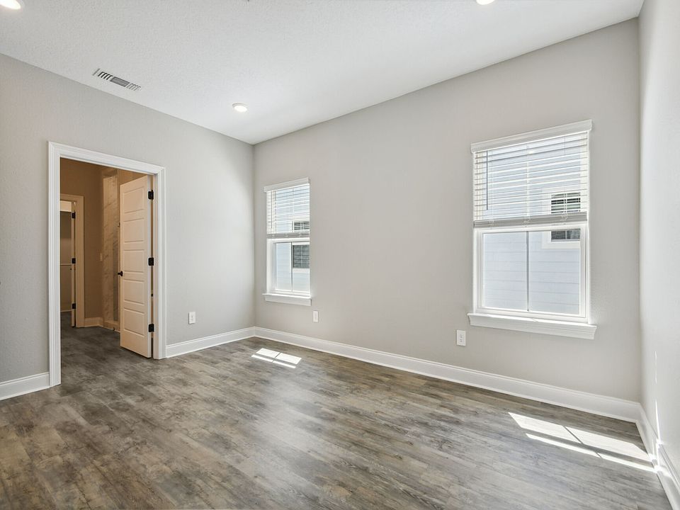 Primary bedroom in the Royale floorplan at a Meritage Homes community in Gulfport, MS.