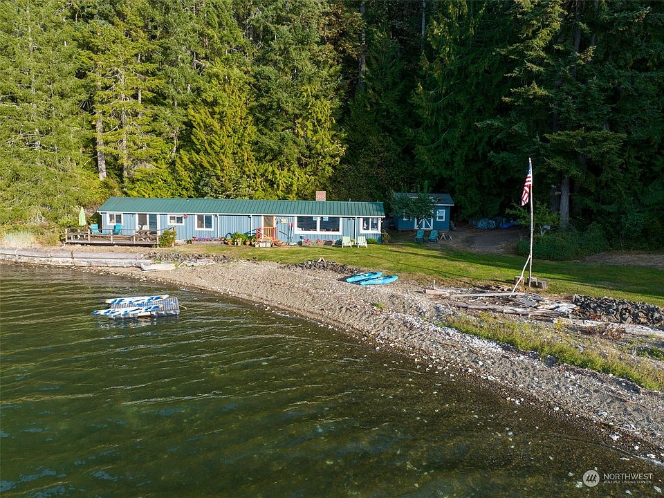 Welcome to beachfront living on North Shore of Hood Canal with 900' of waterfront. Private and secluded on 10 acres. >