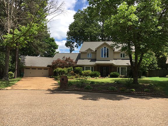 Mature trees in front & back