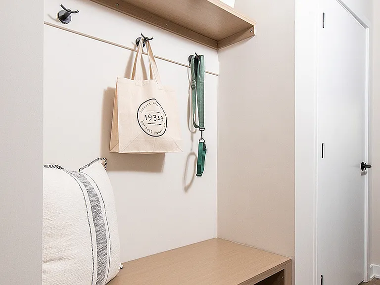 Experience the perfect blend of style and functionality in this beautifully designed entryway nook.