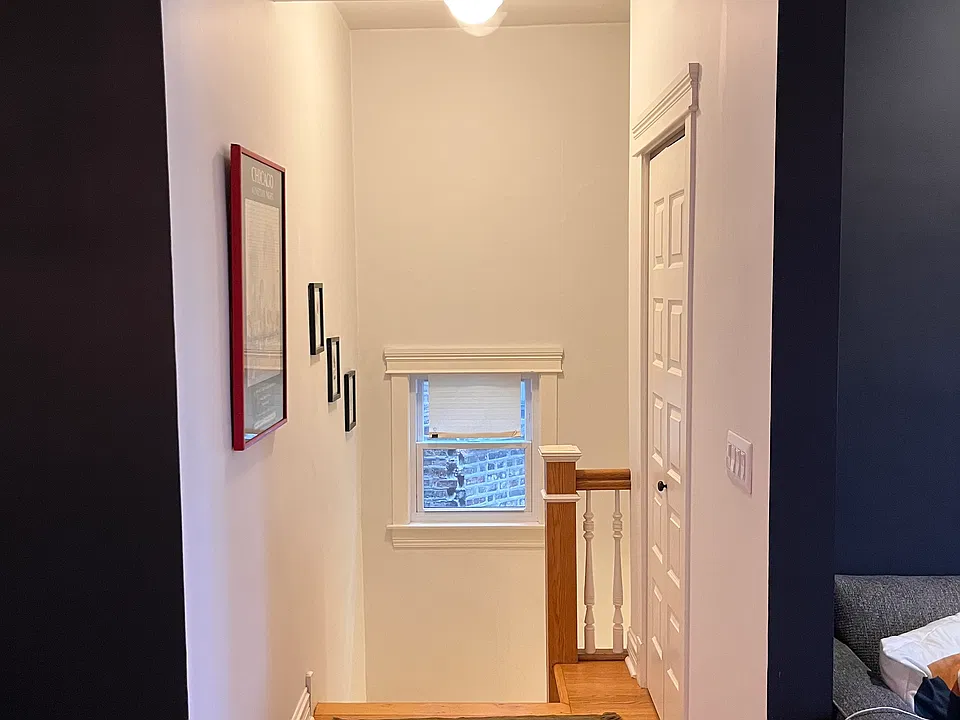 Second floor stairs and coat closet.