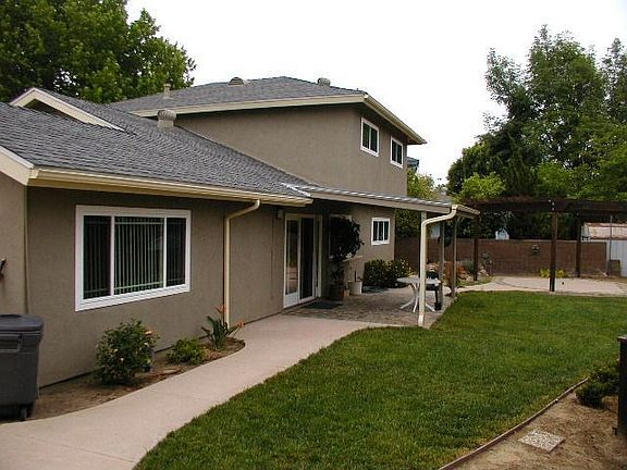 Nice back yard with pergola and gas line for fire table & views of Mt. Soledad