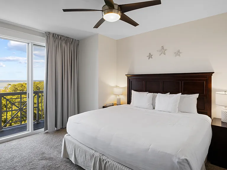 Master bedroom with bay & golf views
