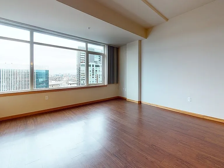 Apartment Living Room with Wood-Style Flooring.