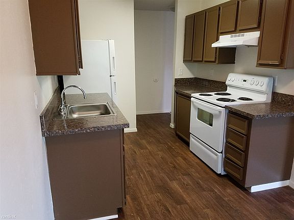 Functional kitchen with full sized appliances.