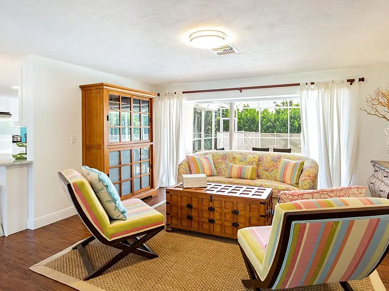 Living room with opening to patio