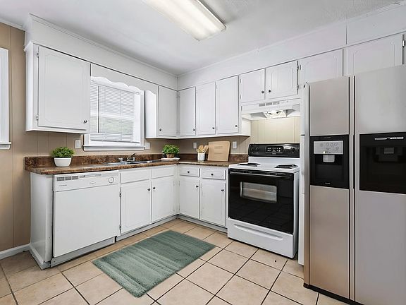 5th image of 3504 12th Ave E #699c48714