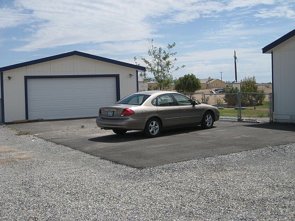 Additional 2 car detached garage with attached 2 car garage