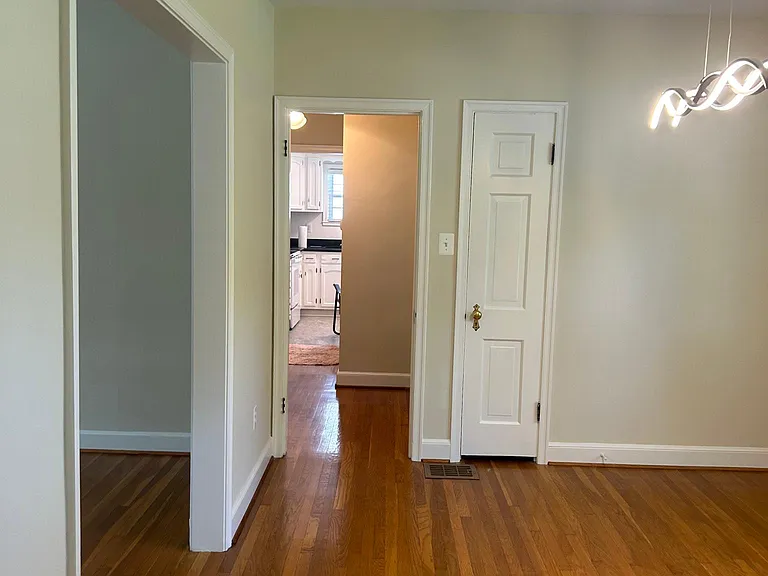 DR looking thru hallway into kitchen