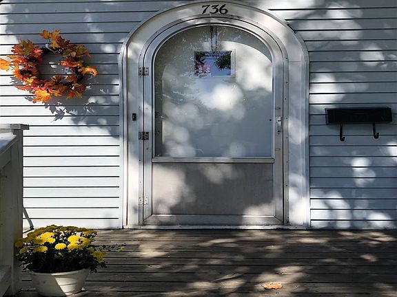 As they enter thru an arched door