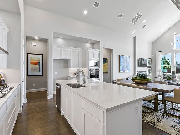 Open first floor in the Keats home plan by Trophy Signature Homes - REPRESENTATIVE PHOTO