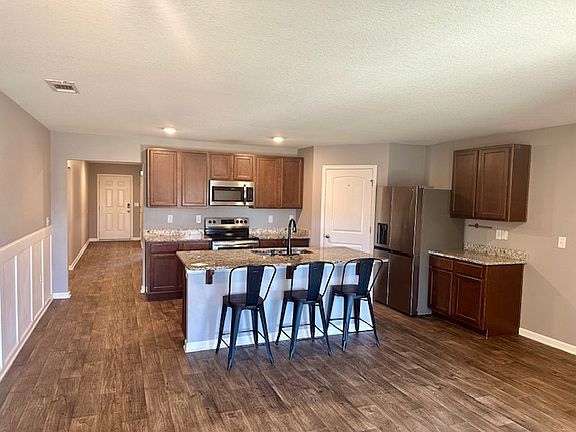 Entryway and kitchen