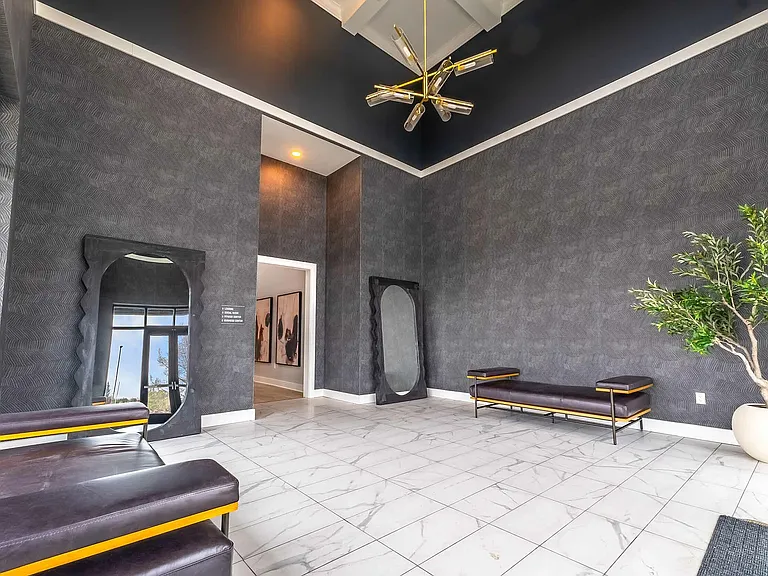 Experience luxury in this elegantly designed lobby, highlighting contemporary decor and comfort.
