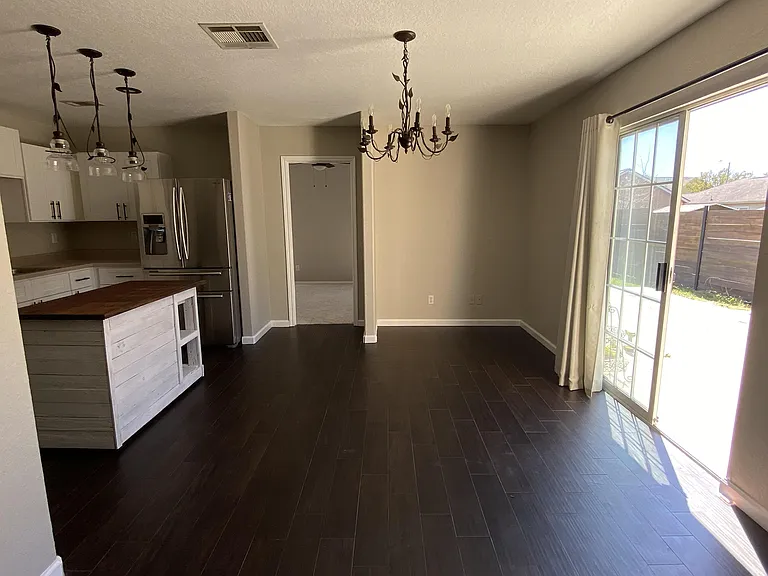 Kitchen eating area and sliding door to patio