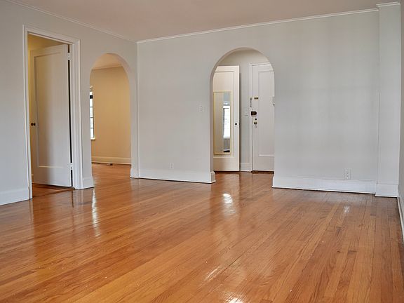 Living room and front hall closet.