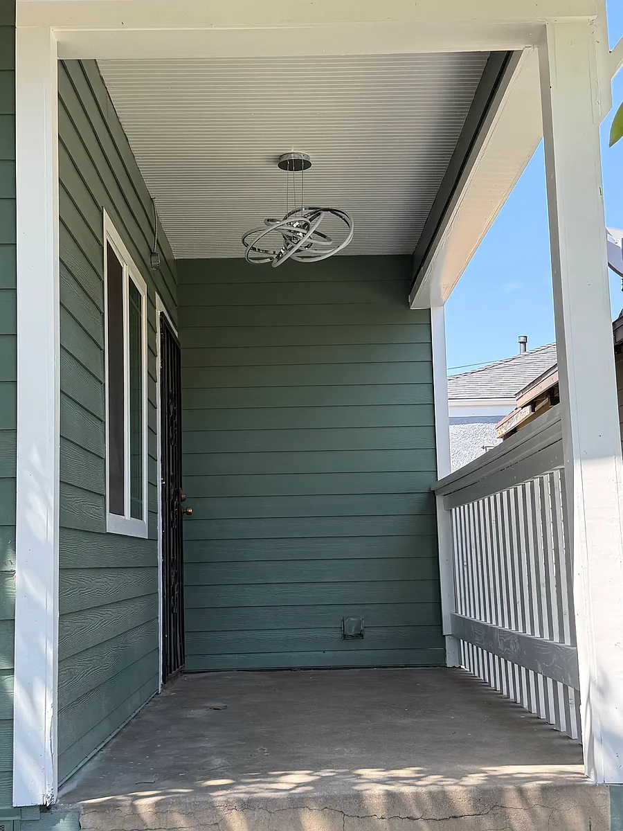 Main entrance with new lighting fixture - 4613 Eugene St #1