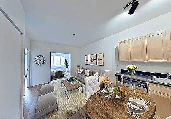 3rd image of 300 E 3rd St APT 2B