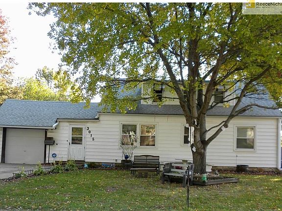 Front view 3015 S 8th Street - Better come have a look. NEW hardwood floors in LR & DR. Large deck with fenced back yard.