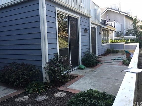 Slider opens to large private patio with no one behind you.