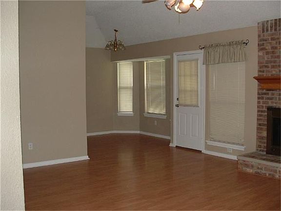 Laminate floors in living area and breakfast room