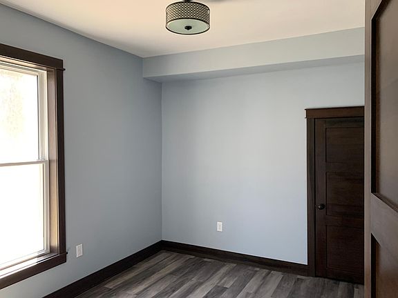 2nd bedroom, with queen bed (not pictured) and dedicated closet.