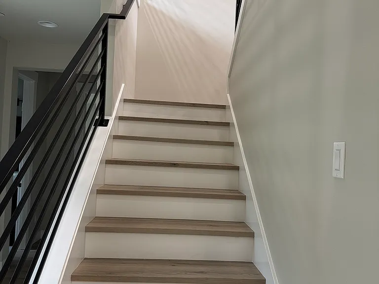 Stairs with metal railings