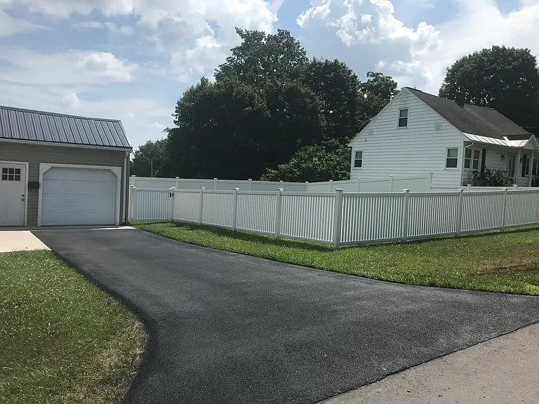 Driveway & fenced in yard
