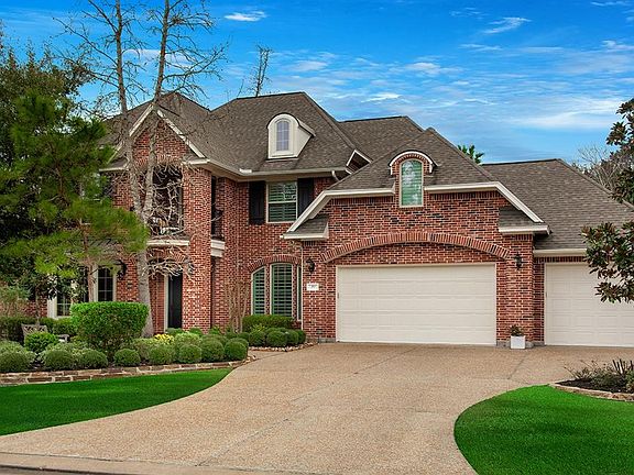 Oversized three-car garage and extra wide driveway