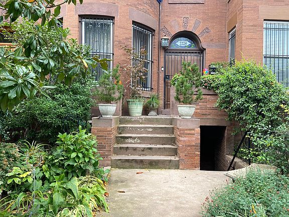 View of the exterior of the house basement rental apartment entrance
