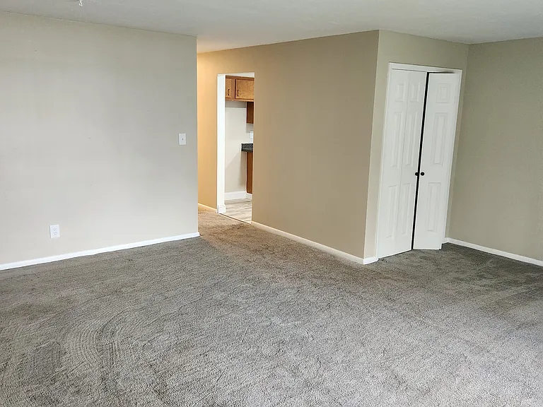 Living Room. New paint throughout, modern accessible beige by Sherwin Williams!