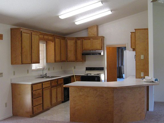 Kitchen from den doors