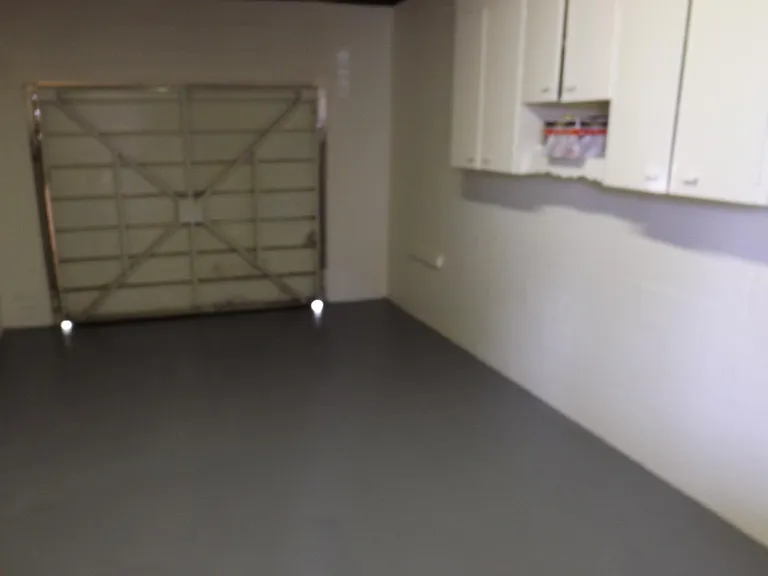 Large Garage with storage cabinets