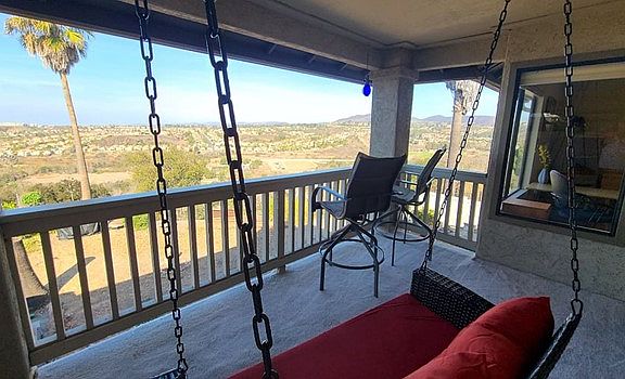 Amazing View from the back balcony - Swing and Chairs for multiple viewing options.