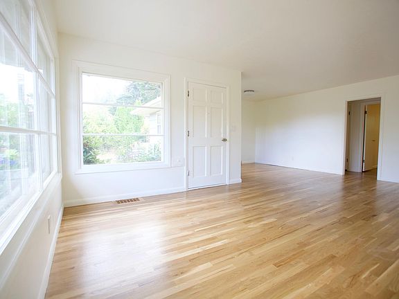 Living Room - Garden view from large windows & Refinished original oak floors