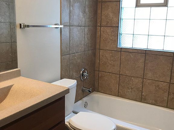 Recently remodeled bathroom with new tile and fixtures