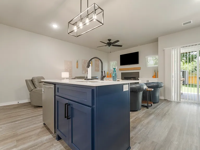 Kitchen is open to the living room and dining room
