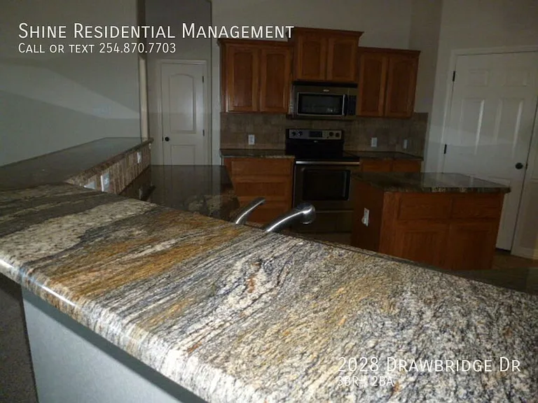 2028 Drawbridge Dr — Photo 10