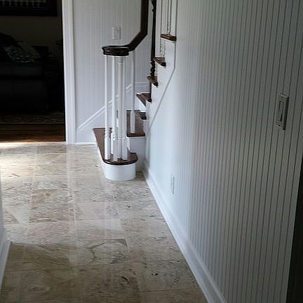 beadboard and marble foyer