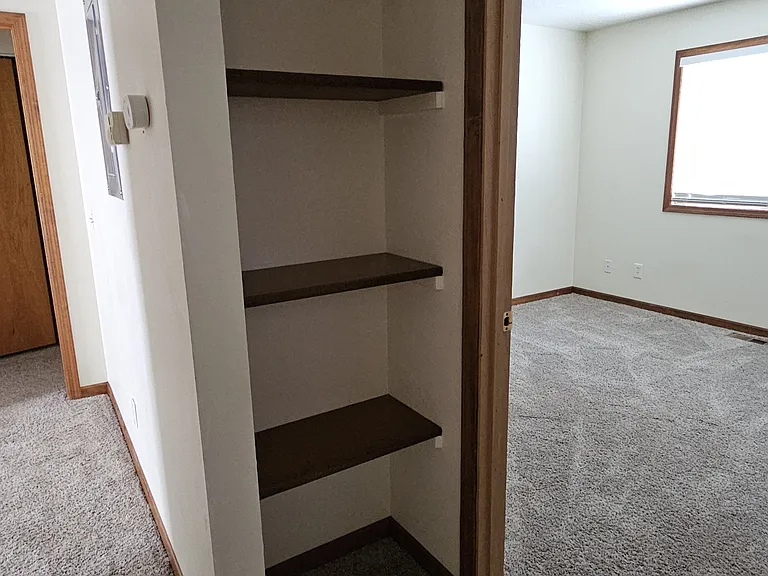 Bedroom three and linen closet.