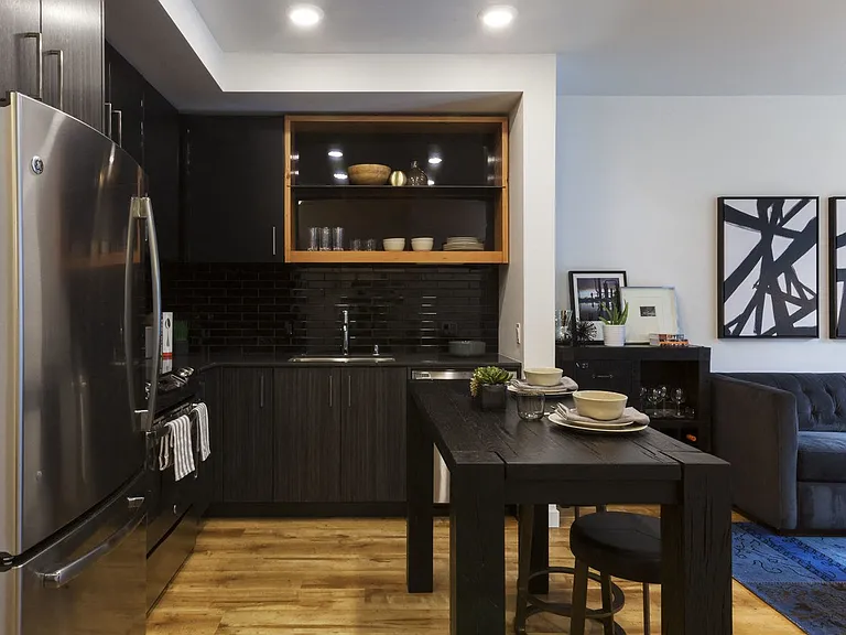 Apartment Interior Showing Dining Table Setup and Living Room Access