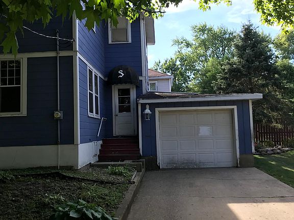 Driveway, garage and back door.