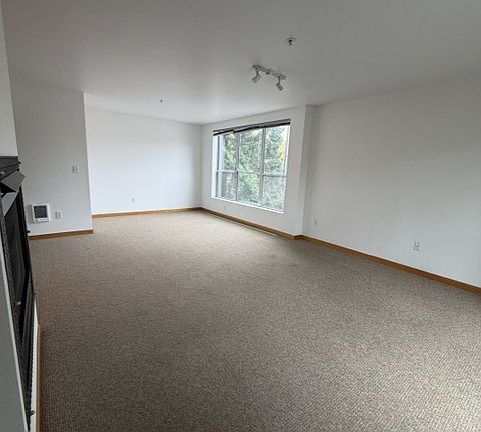 view of living area and large windows for natural light