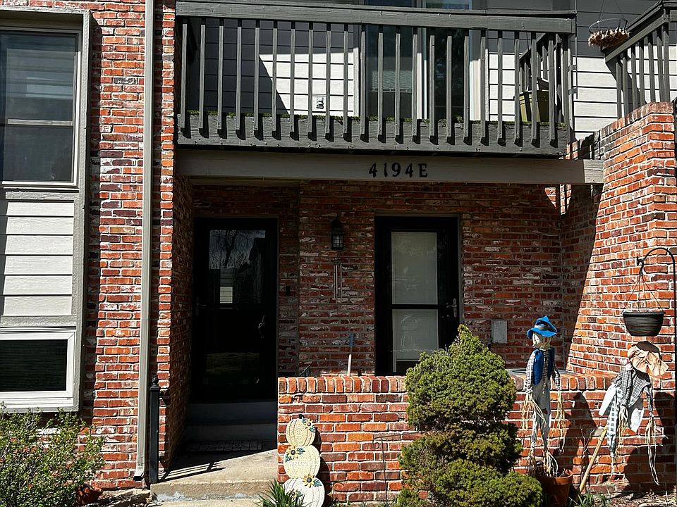 Front Entry with patio (main level and second story balcony)